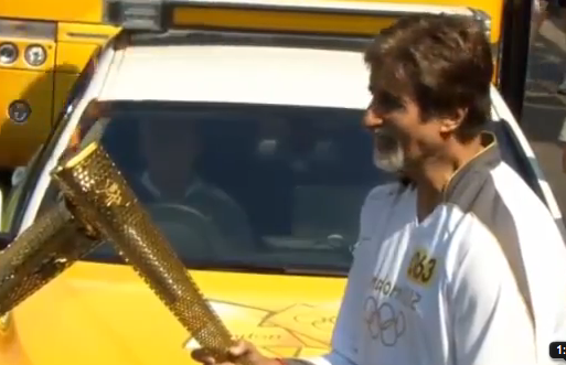 Amitabh Bachchan carries olympic flame