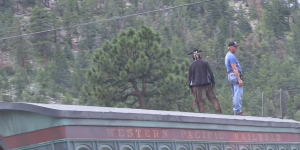 Western Pacific Railroad Train car with Johnny Depp dressed as Tonto and New Mexico in Background